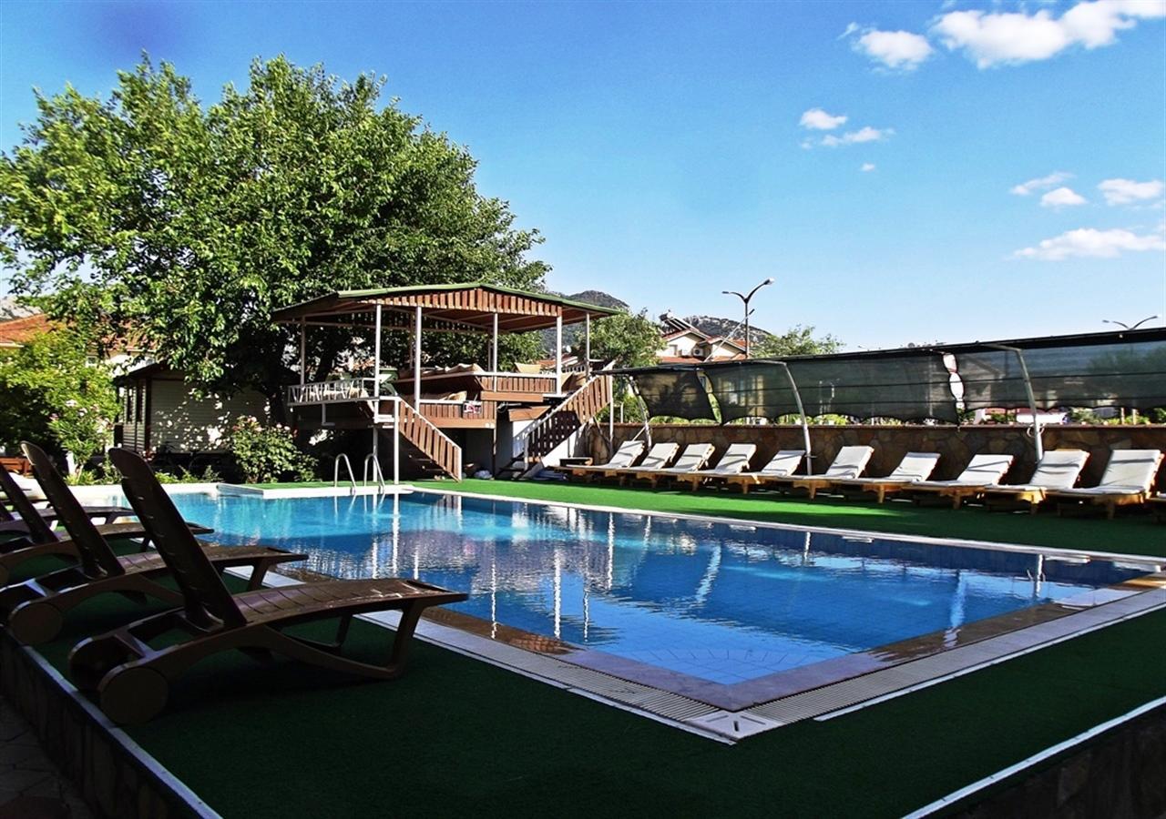 Gurkan Apart Hotel Далян Екстериор снимка