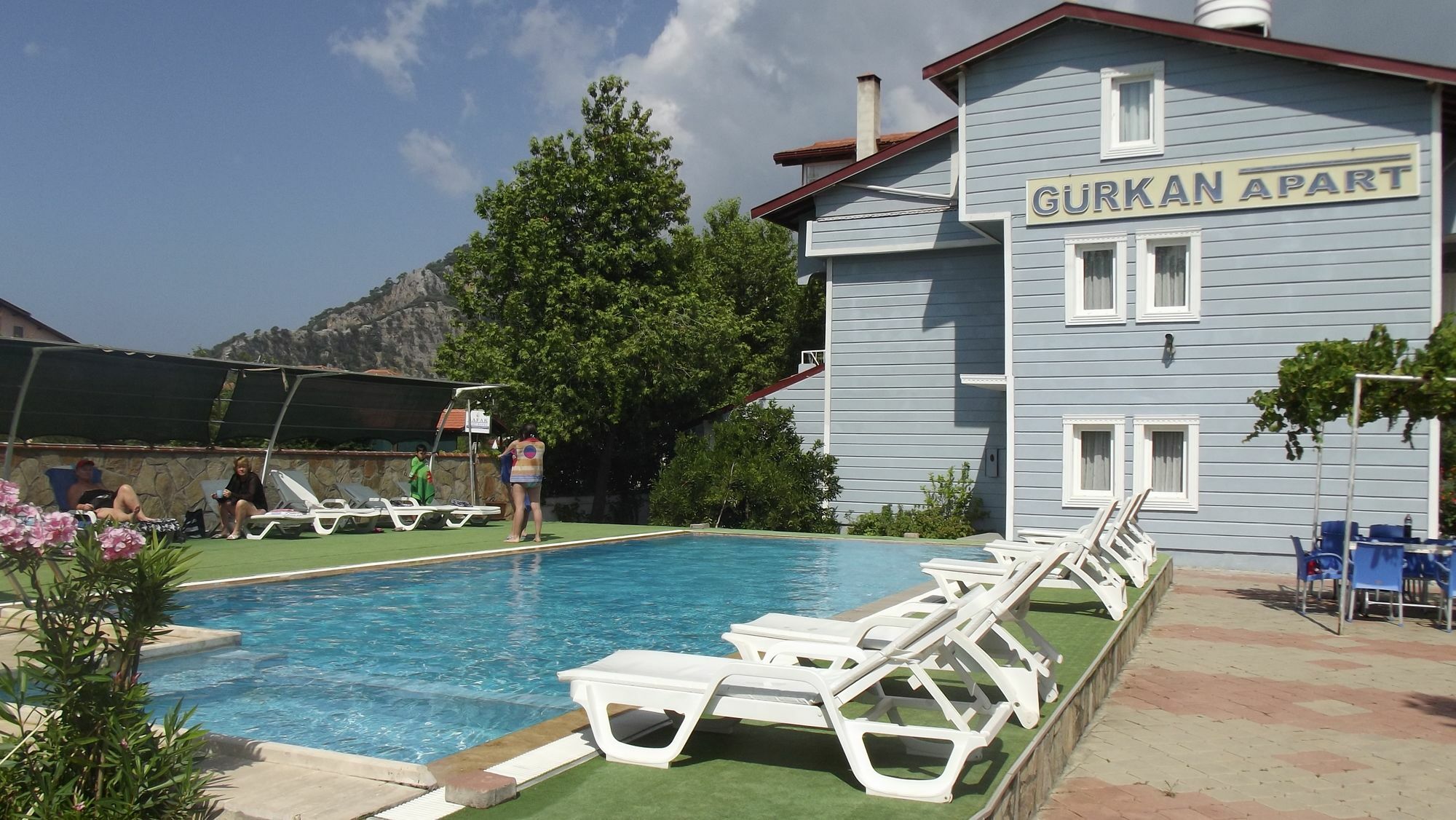 Gurkan Apart Hotel Далян Екстериор снимка